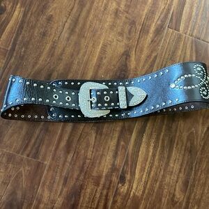 Leather western belt with man-made front.